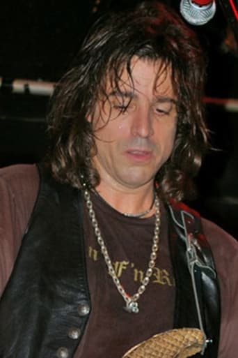 Portrait of Warren DeMartini