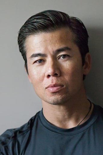 Portrait of Tom T. Tran