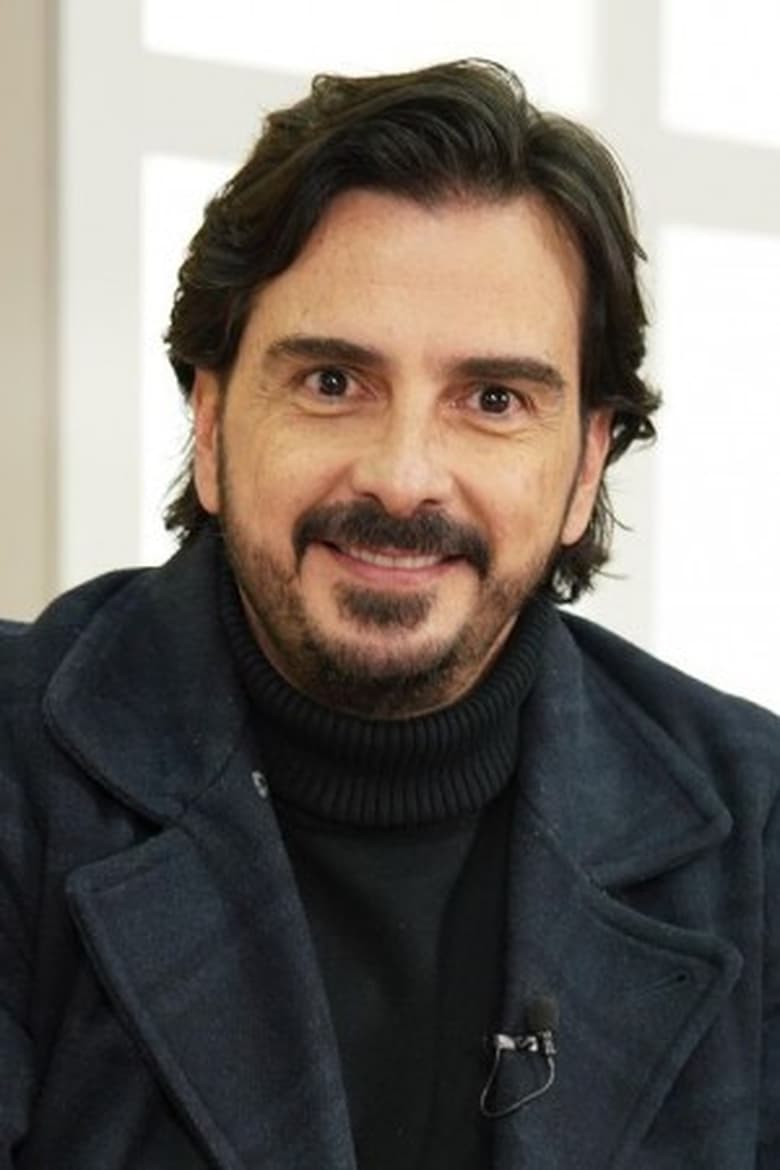 Portrait of Carlos Camacho